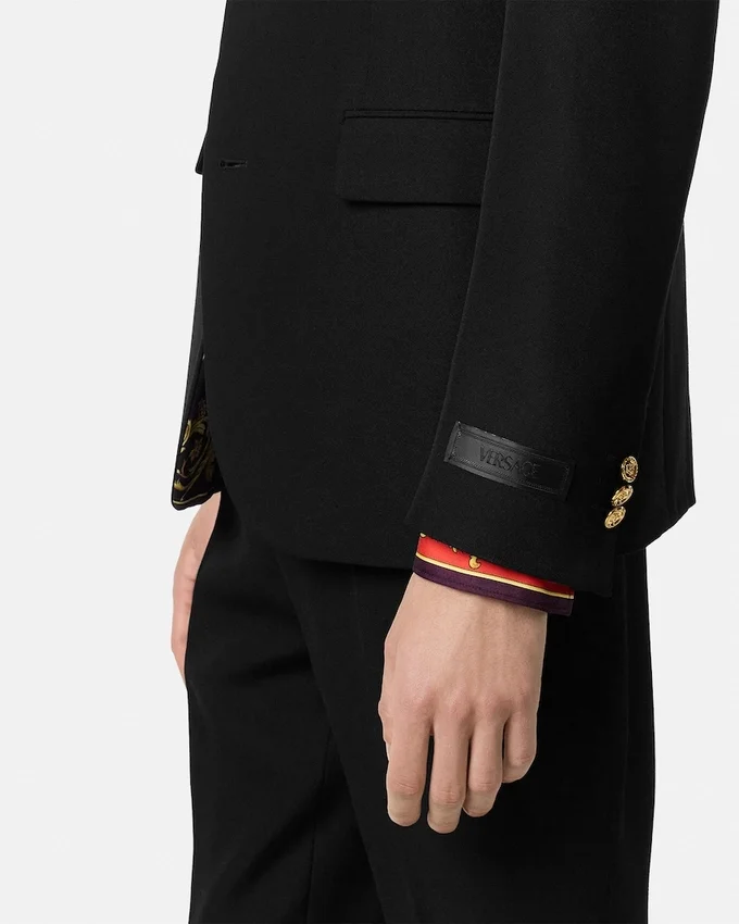 Blazer de lana de botones simples Blazer de lana de botones simples