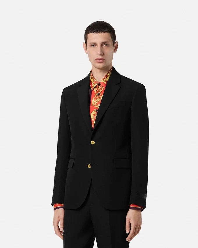 Blazer de lana de botones simples Blazer de lana de botones simples