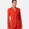 Blazer entallado de lana con tachuelas y botonadura sencilla.