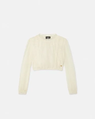 Blusa de encaje para niña