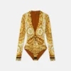 Body ajustado con imperdible Barocco Body ajustado con imperdible Barocco