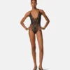 Body con ribete de encaje bordado Body con ribete de encaje bordado