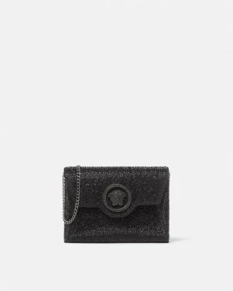 Bolso de mano de satén con adornos La Medusa