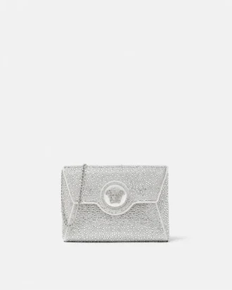 Bolso de mano de satén con adornos La Medusa