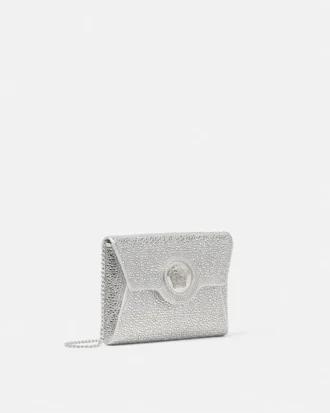 Bolso de mano de satén con adornos La Medusa
