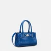 Bolso pequeño con efecto cocodrilo Medusa 95 Bolso pequeño con efecto cocodrilo Medusa 95