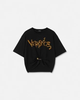 Camiseta corta con imperdibles y pin de seguridad