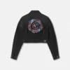 Chaqueta vaquera con emblema floral en V