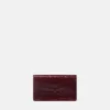 Clutch Medusa 95 con efecto cocodrilo