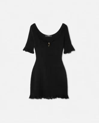 Mini vestido acampanado de punto con imperdible