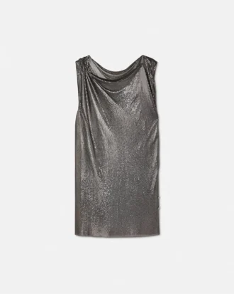 Mini vestido de malla metálica con imperdible