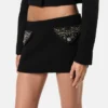 Minifalda de lana con tachuelas