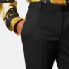 Pantalones ajustados de gabardina de lana elástica