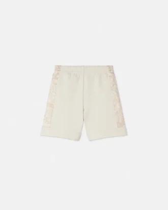 Pantalones cortos deportivos estampados para niño con costura milanesa
