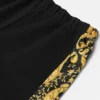 Pantalones cortos deportivos estampados para niño con costura milanesa Pantalones cortos deportivos estampados para niño con costura milanesa