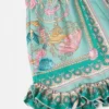 Pantalones cortos infantiles de seda con volantes y estampado Barocco submarino Pantalones cortos infantiles de seda con volantes y estampado Barocco submarino