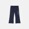 Pantalones de chándal acampanados para niño con logotipo Versace brillante Pantalones de chándal acampanados para niño con logotipo Versace brillante