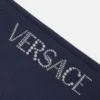 Pantalones de chándal acampanados para niño con logotipo Versace brillante Pantalones de chándal acampanados para niño con logotipo Versace brillante