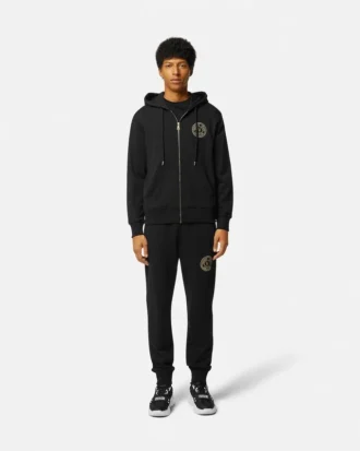 Pantalones deportivos con emblema en V