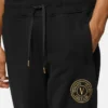 Pantalones deportivos con emblema en V