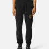 Pantalones deportivos con emblema en V