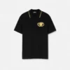 Polo con escudo bordado Polo con escudo bordado