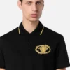 Polo con escudo bordado Polo con escudo bordado