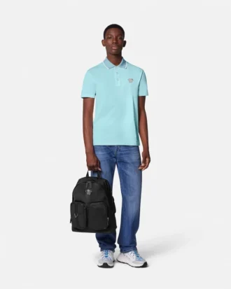Polo con Medusa bordada