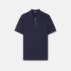 Polo de algodón piqué con medio cremallera y bordado Polo de algodón piqué con medio cremallera y bordado