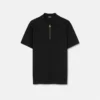 Polo de algodón piqué con medio cremallera y bordado Polo de algodón piqué con medio cremallera y bordado