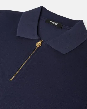 Polo de algodón piqué con medio cremallera y bordado