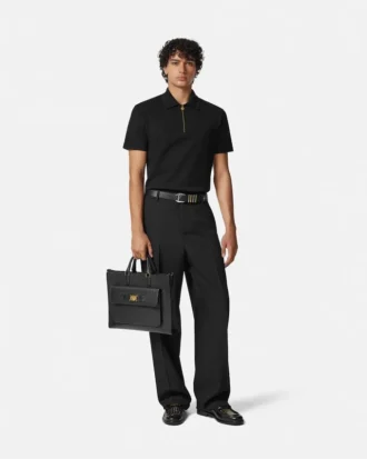 Polo de algodón piqué con medio cremallera y bordado