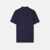 Polo de algodón piqué con medio cremallera y bordado Polo de algodón piqué con medio cremallera y bordado