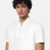 Polo de algodón piqué con medio cremallera y bordado Polo de algodón piqué con medio cremallera y bordado