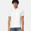 Polo de algodón piqué con medio cremallera y bordado Polo de algodón piqué con medio cremallera y bordado
