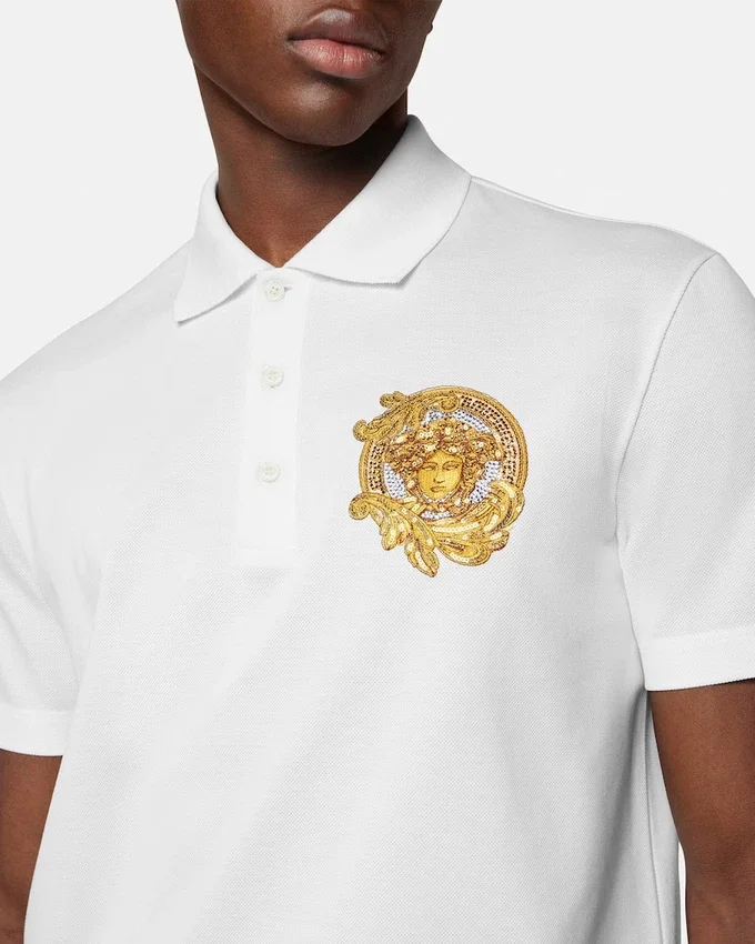 Polo de piqué de algodón bordado Polo de piqué de algodón bordado