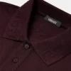 Polo de piqué de algodón bordado Polo de piqué de algodón bordado