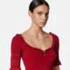 Top de punto con imperdible Top de punto con imperdible