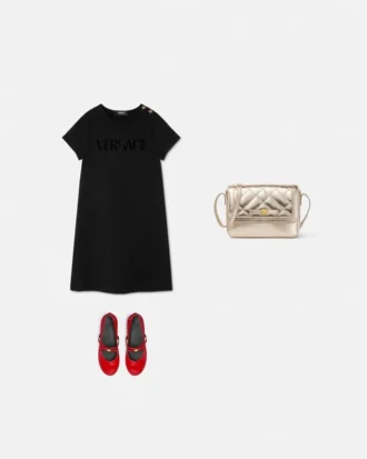 Vestido acampanado con adornos de punto milanés para niña