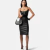 Vestido midi con corsé de piel