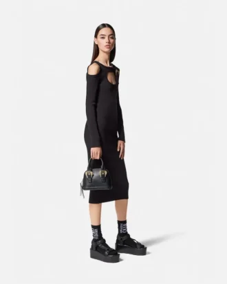 Vestido midi con corte y hebilla barroca