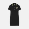 Vestido polo midi con emblema en V
