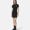 Vestido polo midi con emblema en V