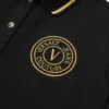 Vestido polo midi con emblema en V
