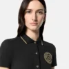 Vestido polo midi con emblema en V