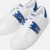 Zapatillas adornadas con Greca Zapatillas adornadas con Greca